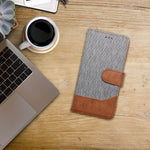 EtuizklapknaiPhone17AIRJeansBookszare4